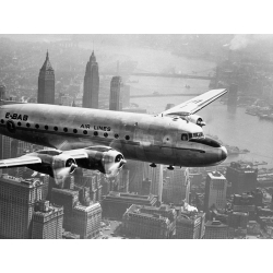 Tableau sur toile. Anonyme, Avion en vol sur New York, 1946